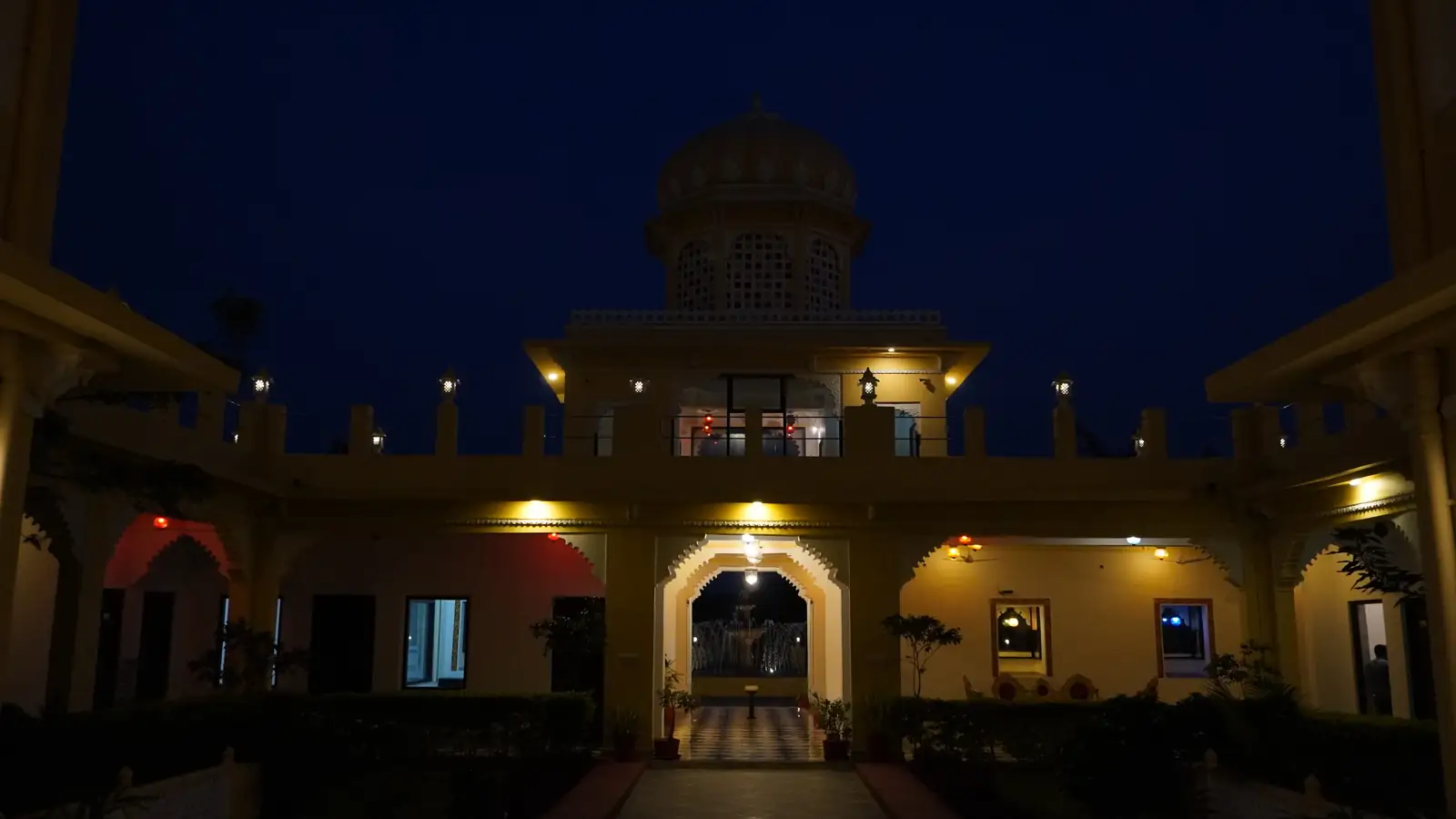 The palace's central domed courtyard, lit up at night